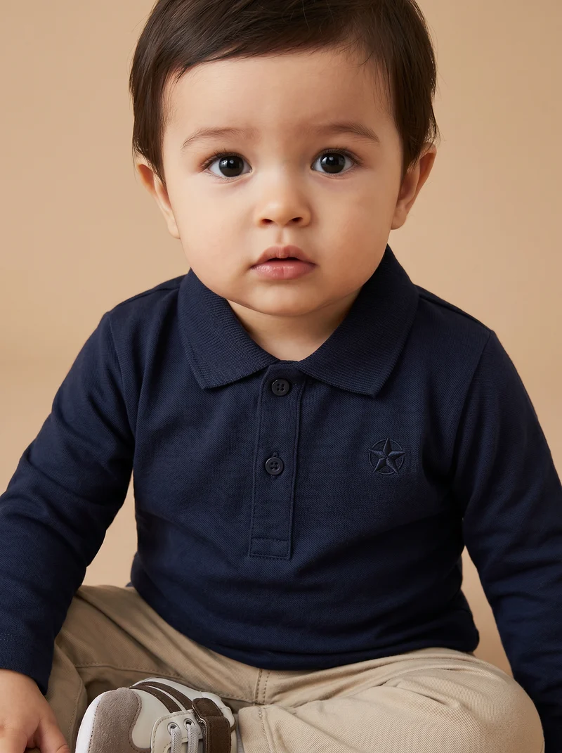 Polo in cotone con ricamo e inserti - Blu