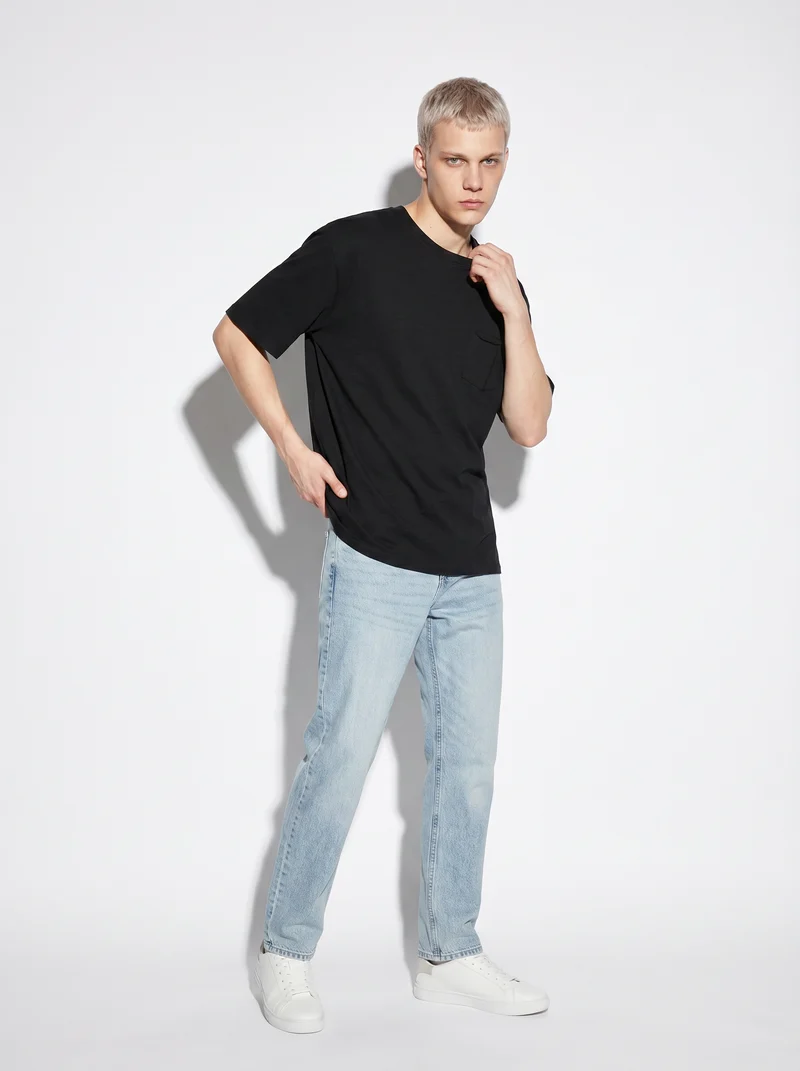 T-shirt cotone slub loose fit con tasca - Nero