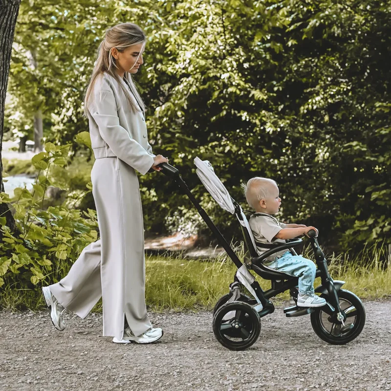 Triciclo Explorer Luxe con maniglione - Pieghevole con cestino color crema