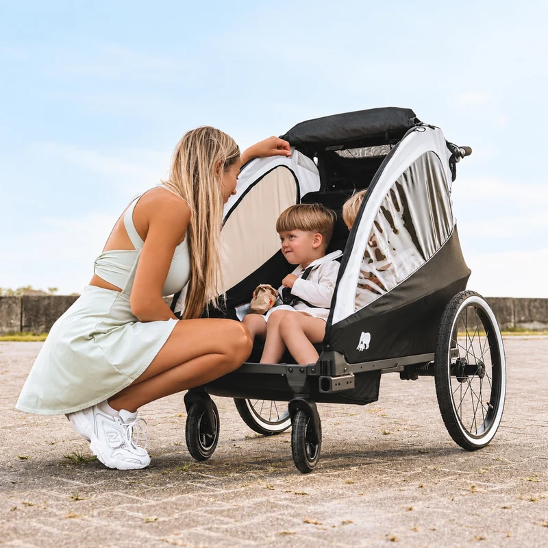 Rimorchio per biciclette di lusso 3 in 1: passeggino e jogger - Nero/Crema