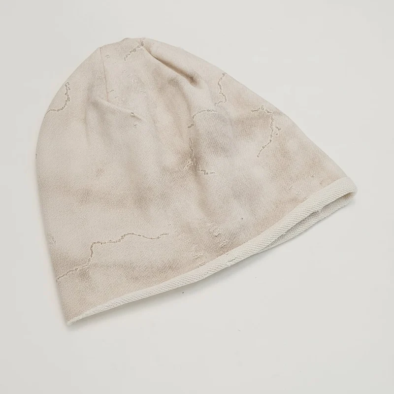 Cuffia melange con strappi a stella - Bianco sporco