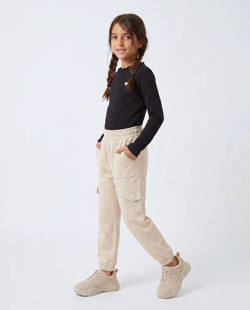 Jogger bambina comodi con tasconi e vita elastica - Beige