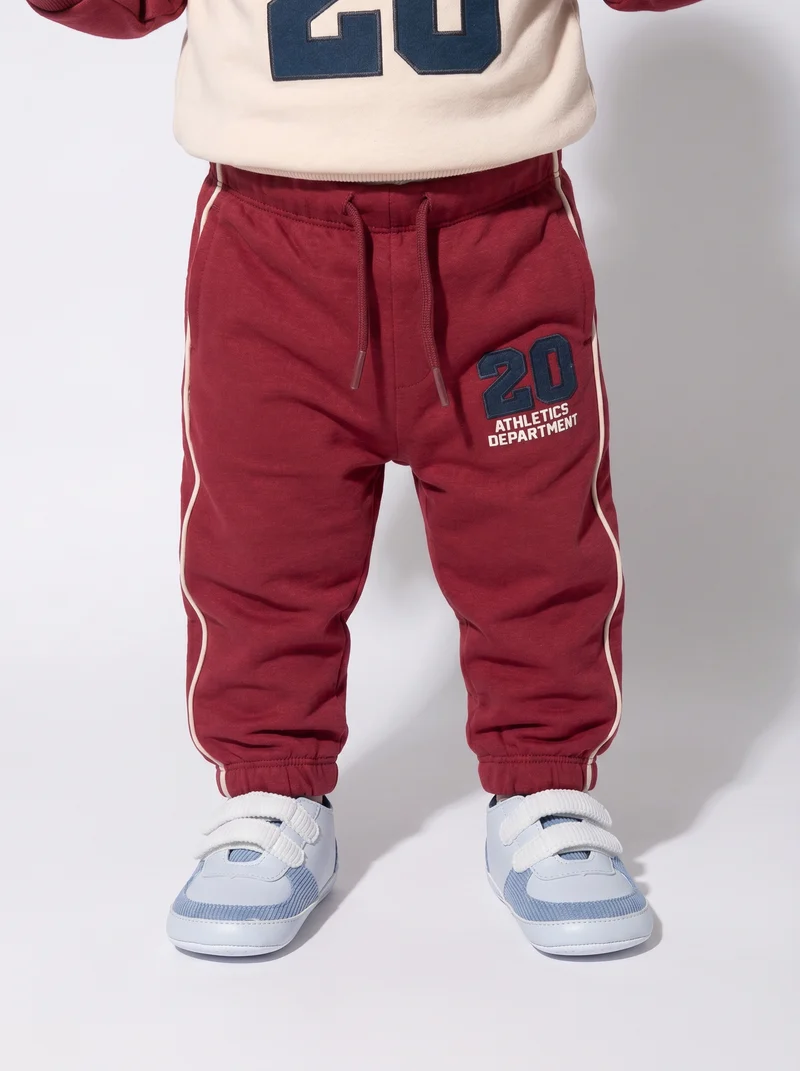 Pantaloni jogger con dettagli - Bordeaux
