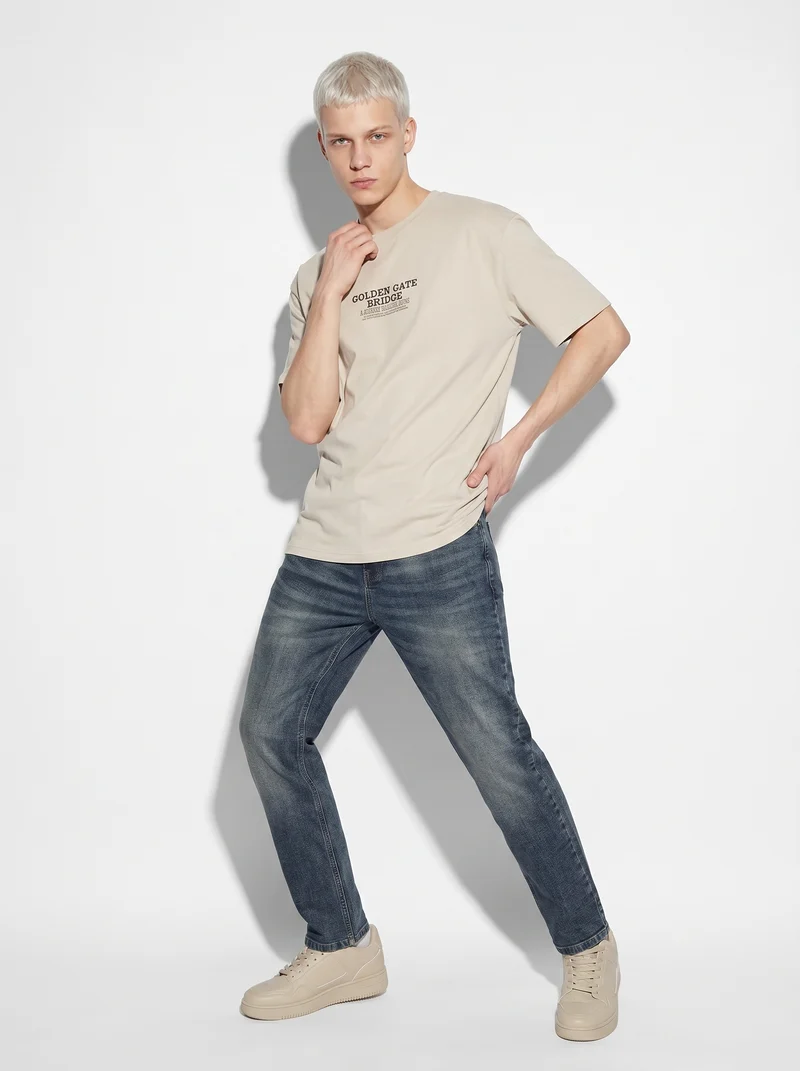 T-shirt cotone con stampa a rilievo - Beige