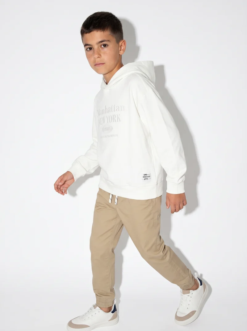 Felpa in cotone con ricamo frontale - Bianco latte