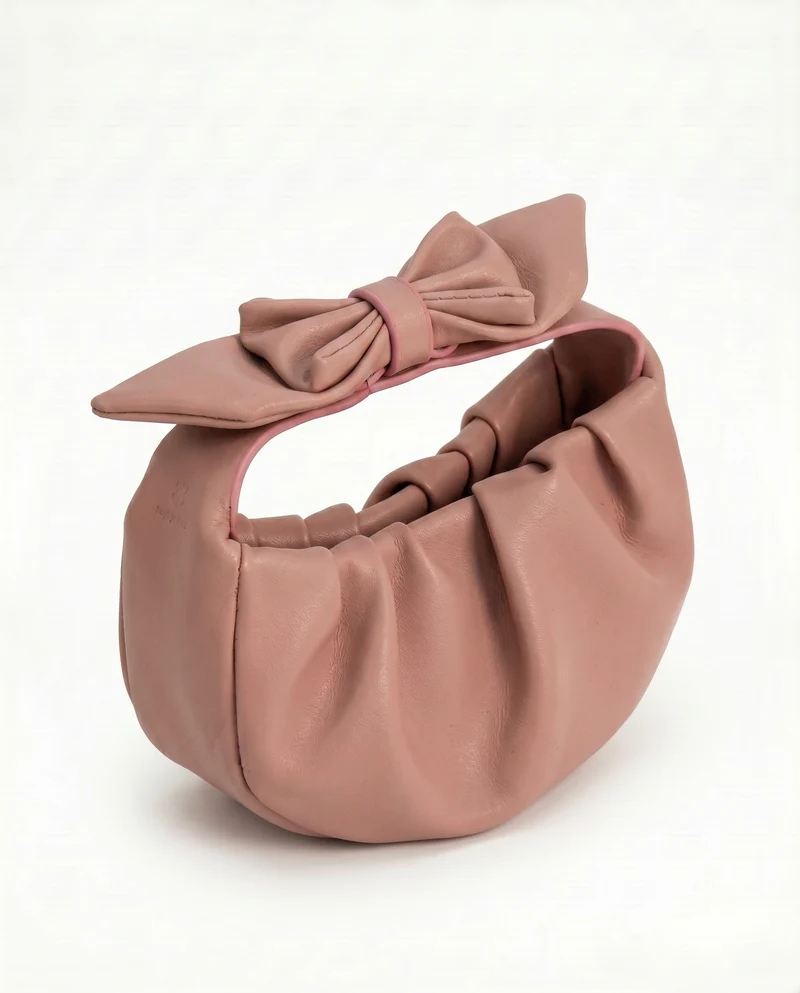 Borsetta arricciata con fiocco grande - Rosa