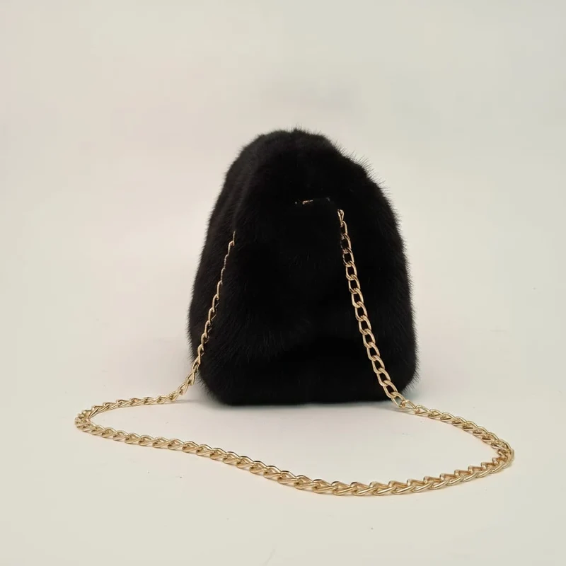 Clutch in finta pelliccia chic - Nero