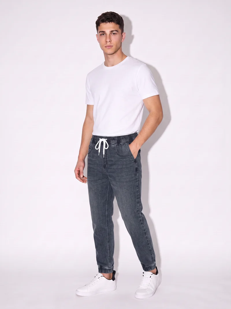 Jeans jogger con vita elasticizzata - Denim