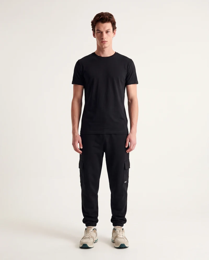 Pantaloni in felpa con tasconi laterali - Nero