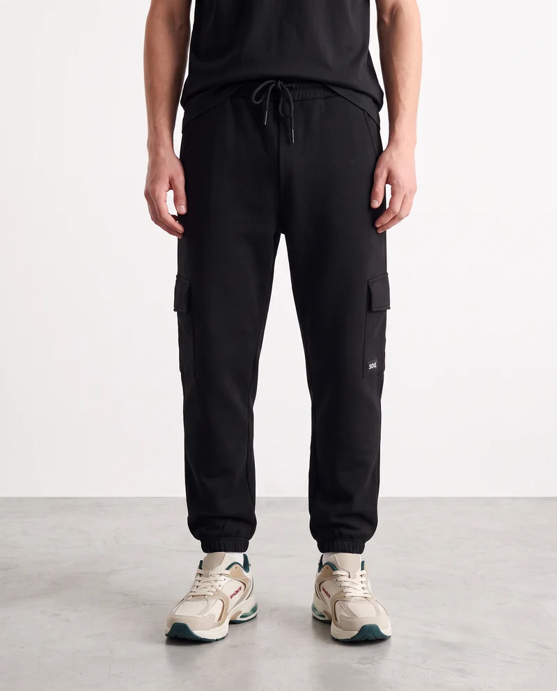 Pantaloni in felpa con tasconi laterali - Nero