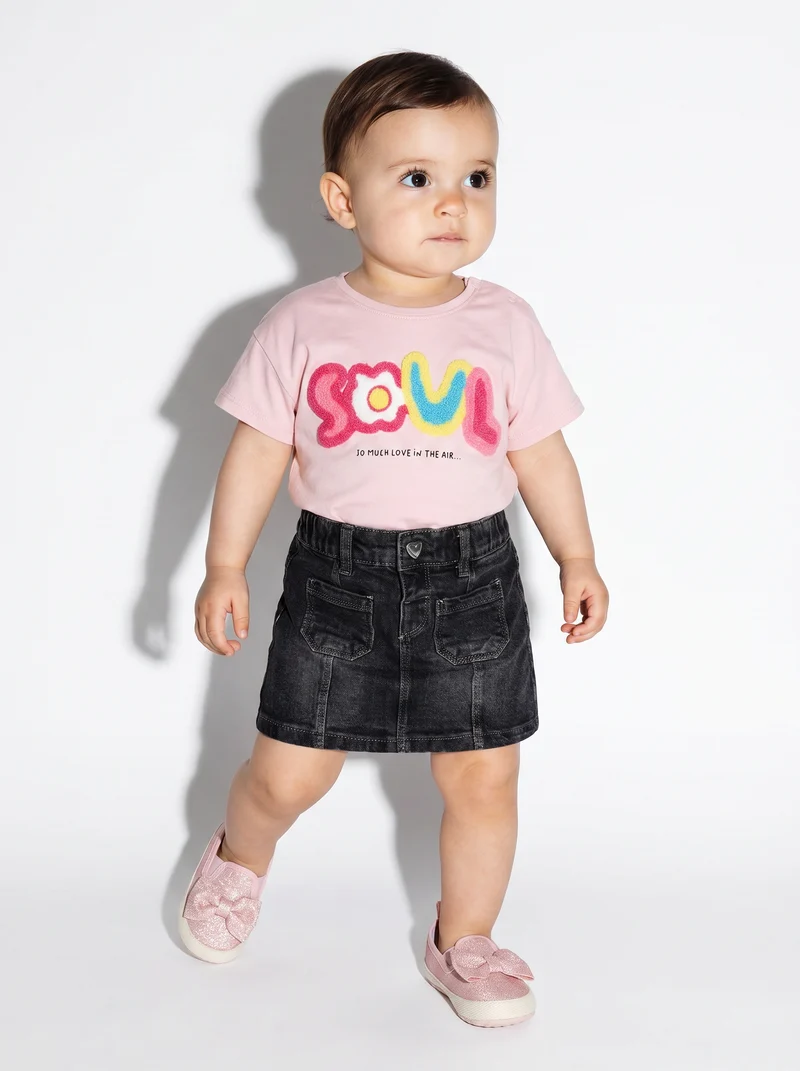 Gonna corta in denim versatile e chic - Nero