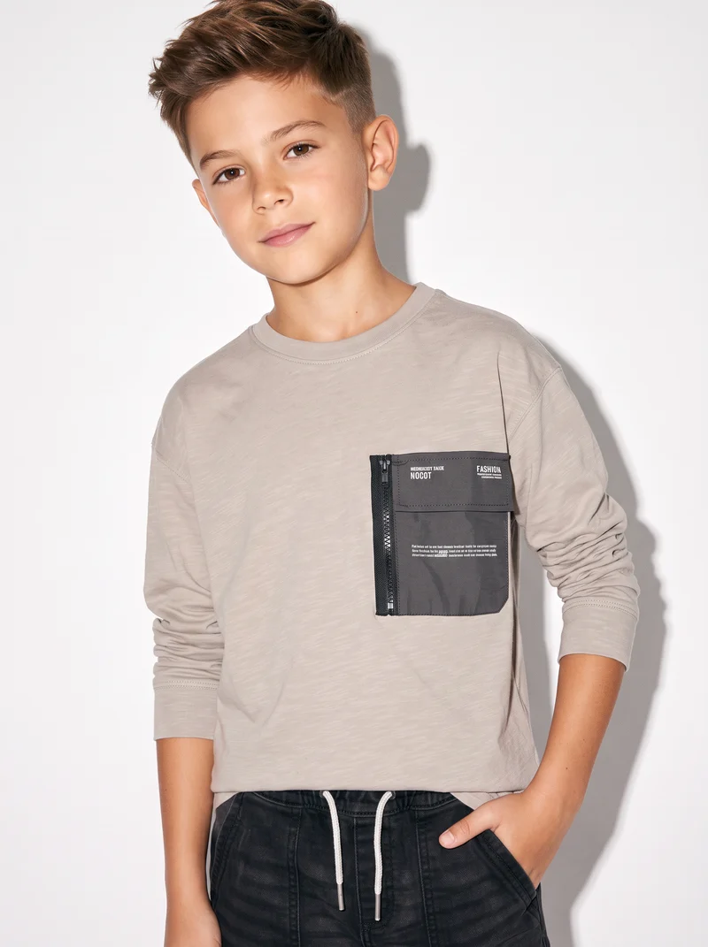 T-shirt effetto slub con maxi tasca - Beige