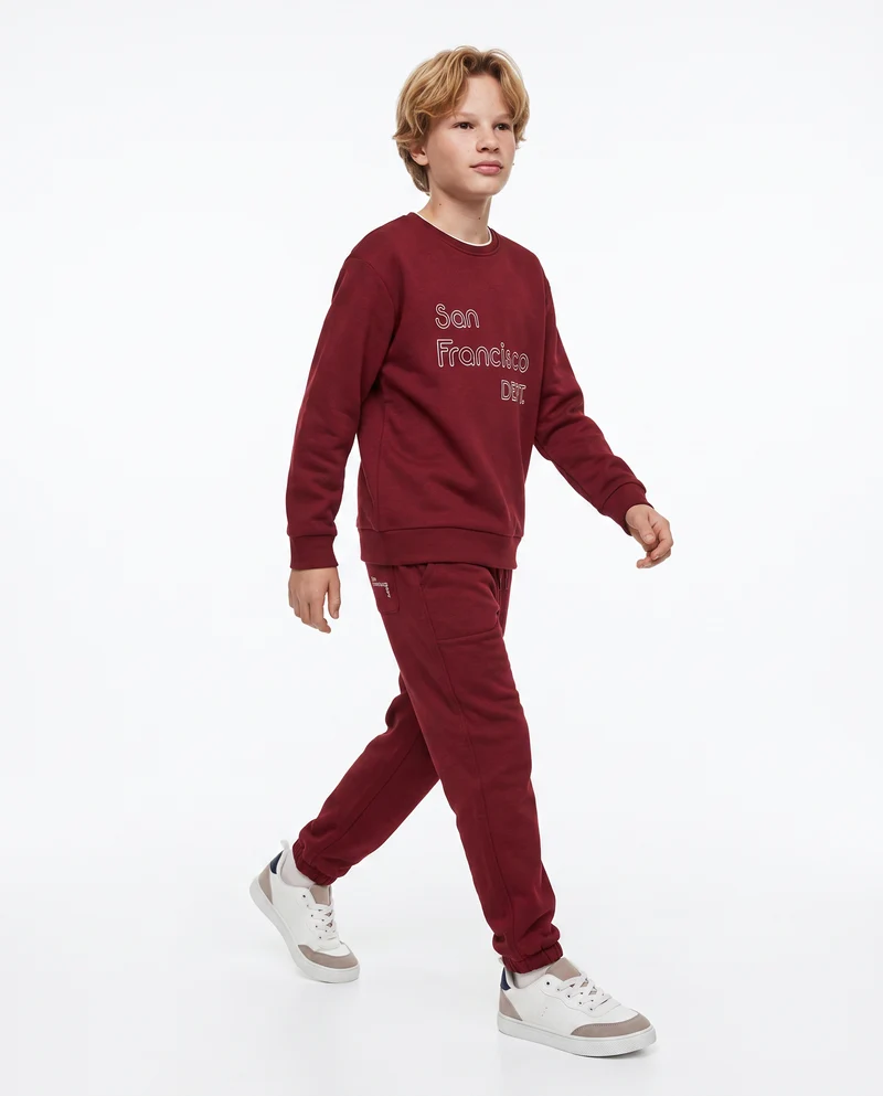 Jogger college con ricamo e tasche - Bordeaux