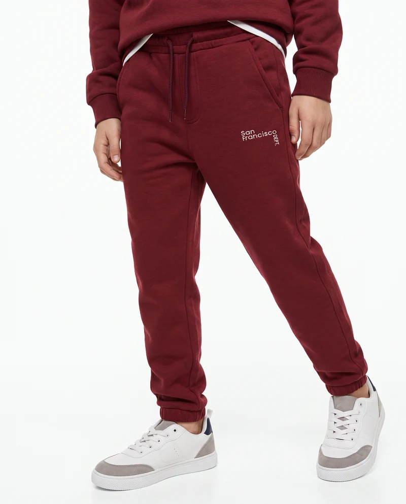 Jogger college con ricamo e tasche - Bordeaux