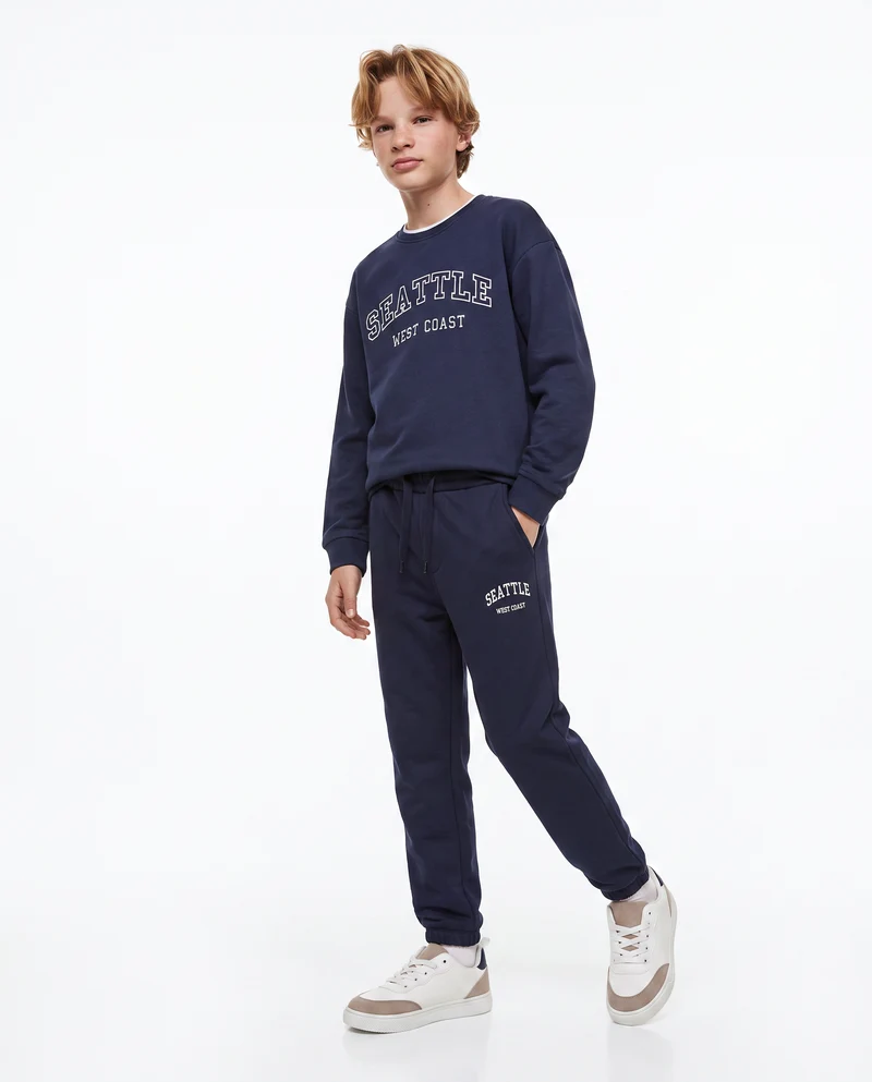 Jogger college con ricamo e tasche - Blu