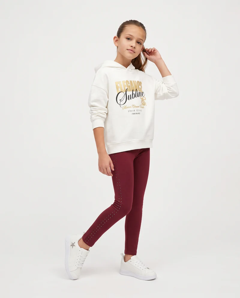 Leggings in interlock con borchie laterali - Bordeaux