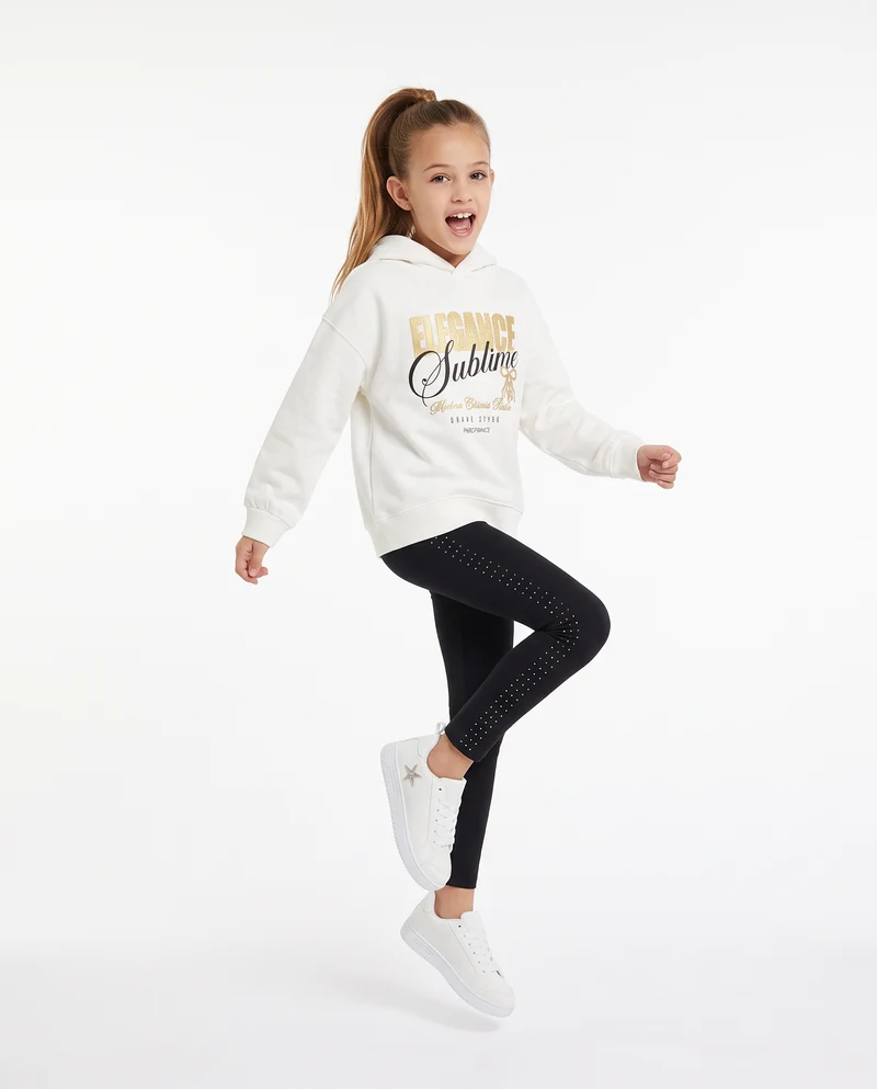Leggings in interlock con borchie laterali - Nero