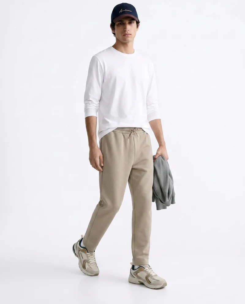 Pantaloni in felpa con vita jogger - Beige