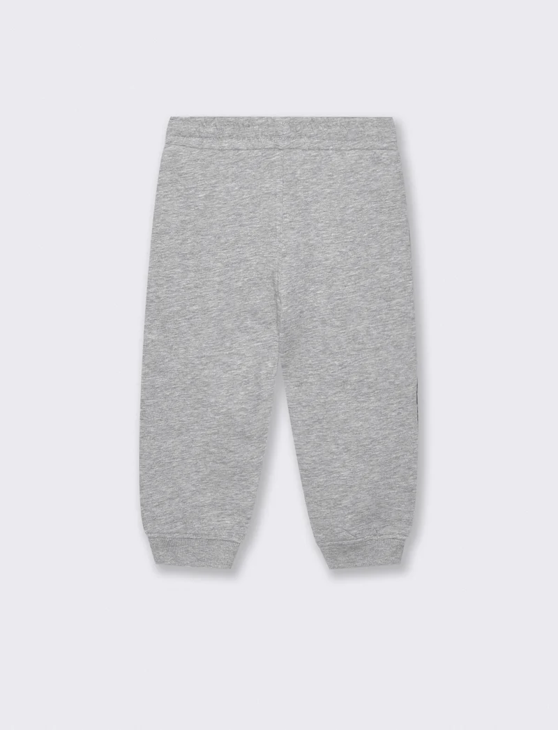 Pantaloni jogger con dettagli a contrasto - Grigio mel.