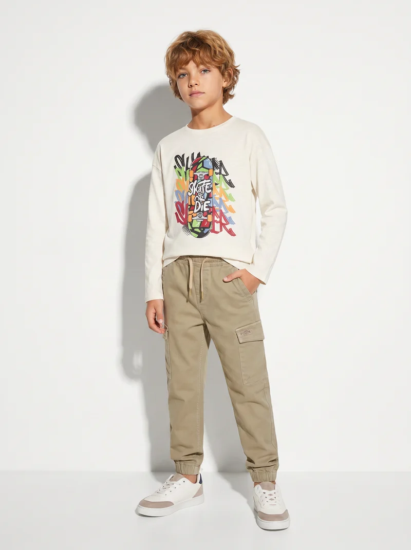 Jogging e pantaloni cargo in maglia - Beige