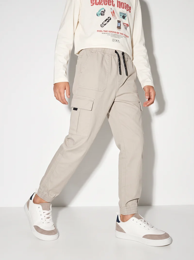 Pantaloni jogger in cotone elastico - Beige