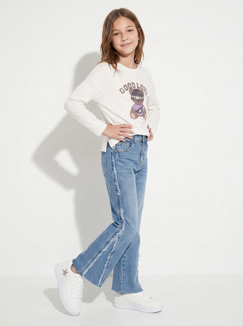 Jeans flare fit con frange laterali - Denim