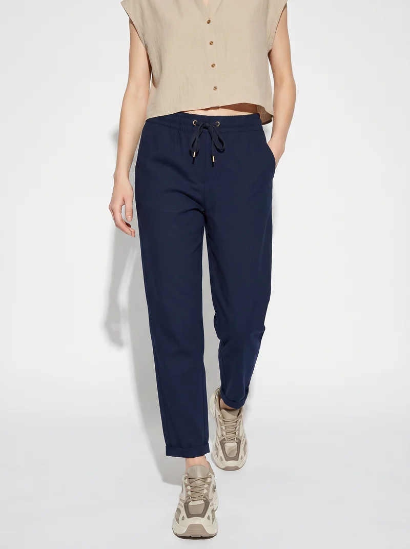 Pantalone con elastico e coulisse in vita - Blu