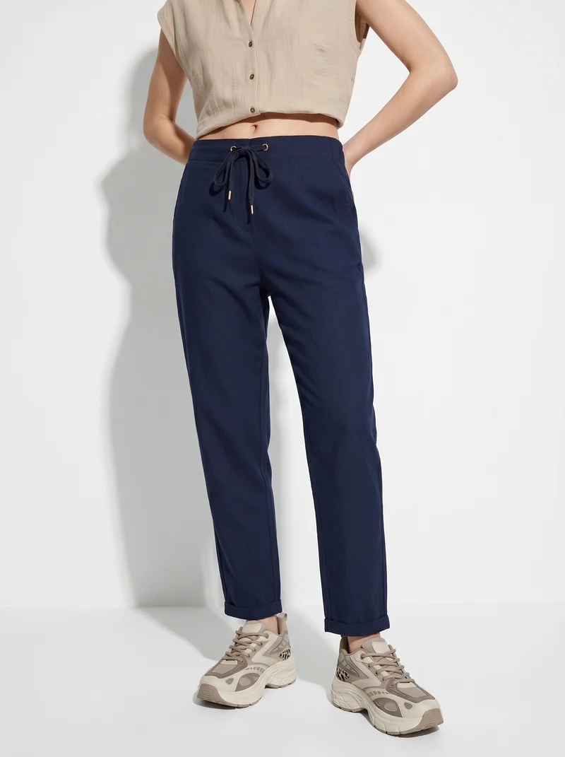 Pantalone con elastico e coulisse in vita - Blu