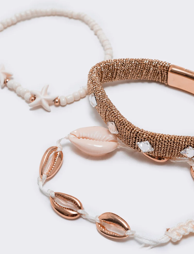 Bracciali conchiglie e stelle marine - Oro rosa