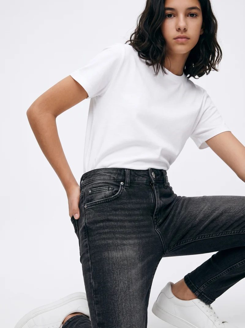 Jeans cinque tasche in denim elasticizzato - Nero