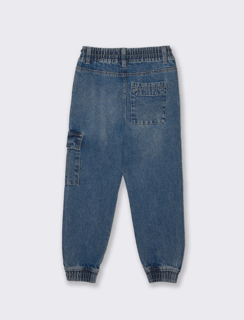 Jogging in denim con tasca laterale - Denim