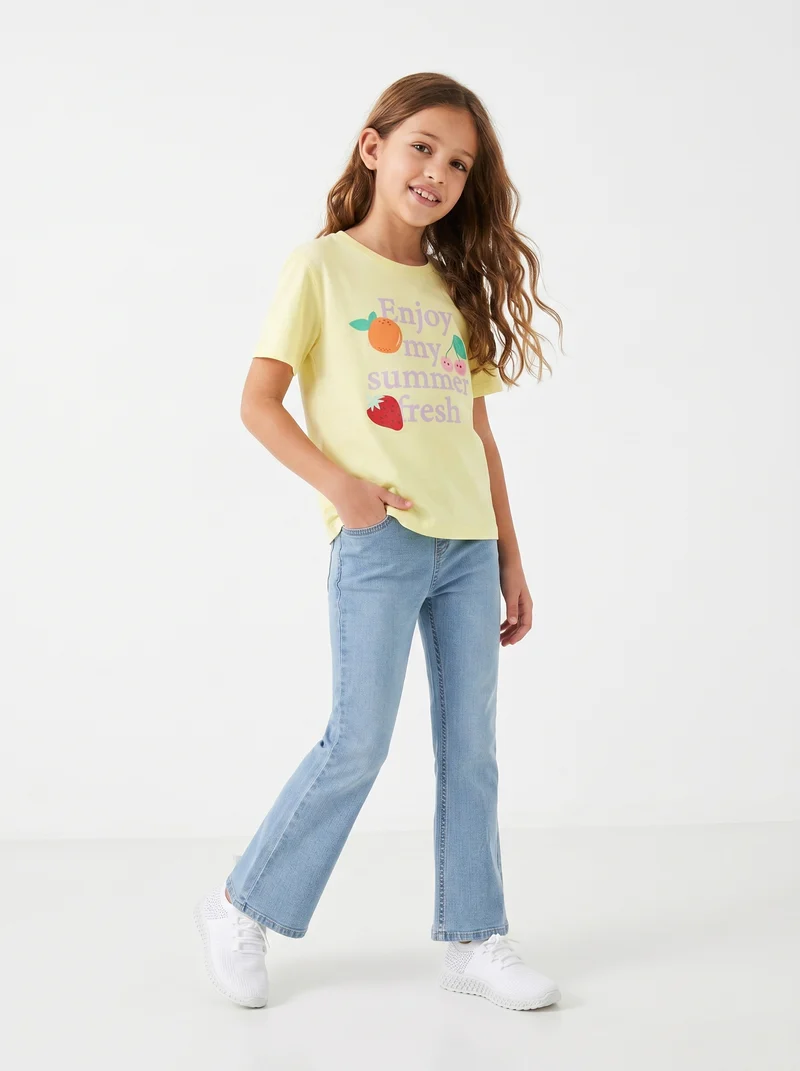 T-shirt bambina con stampa e spacchetti - Giallo