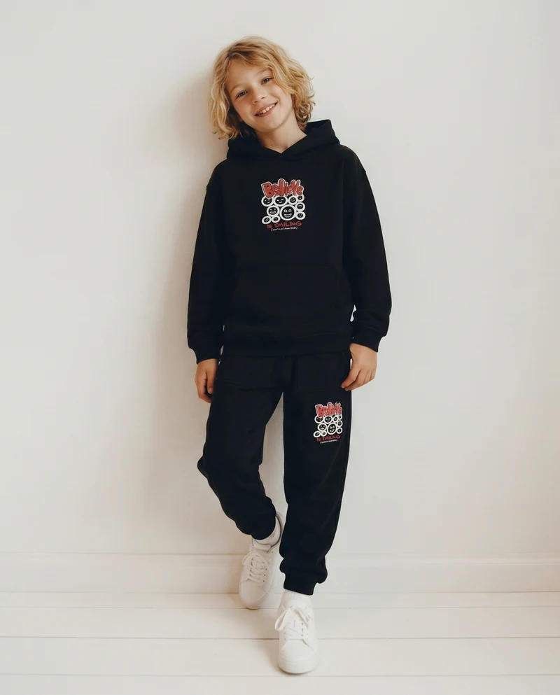 Jogger in cotone con tasche e coulisse - Nero