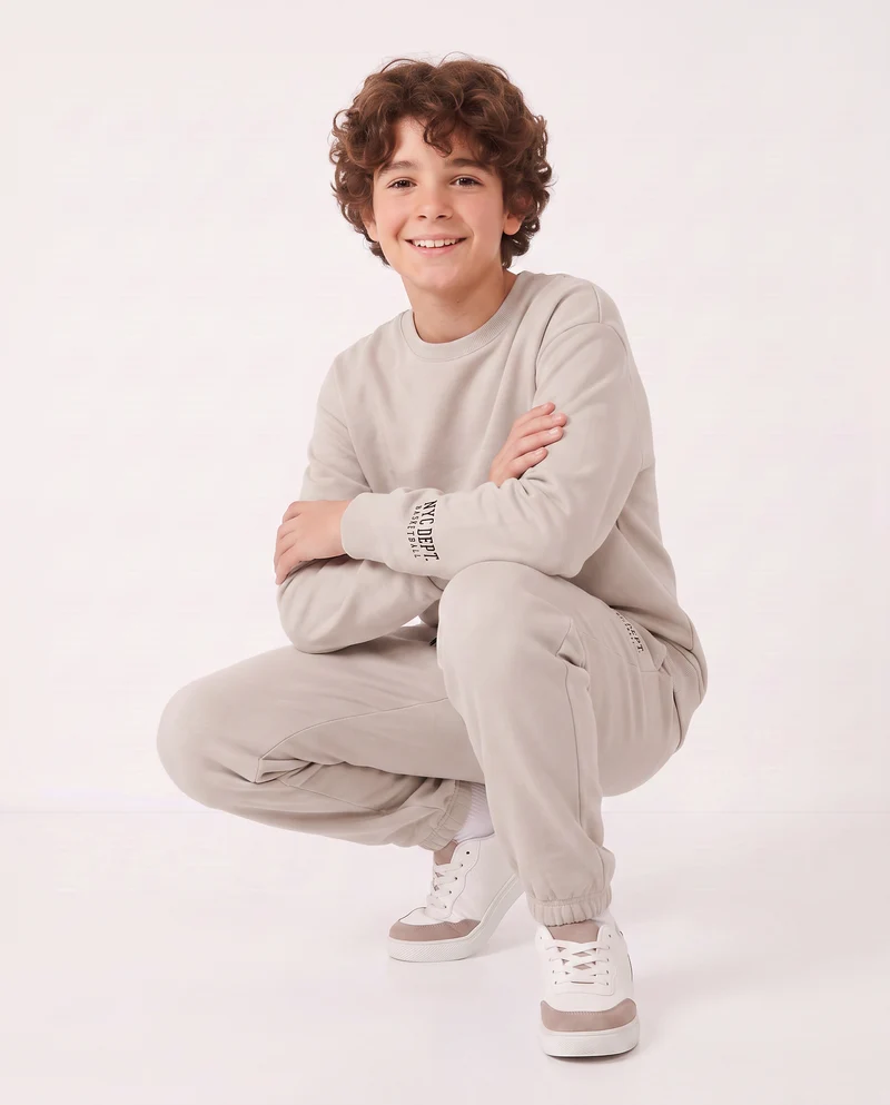 Jogger in felpa con coulisse e patch - Beige