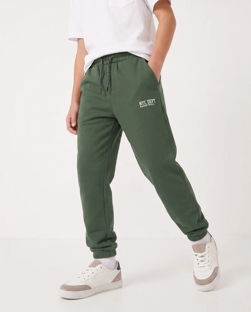 Jogger in felpa con coulisse e patch - Verde abete