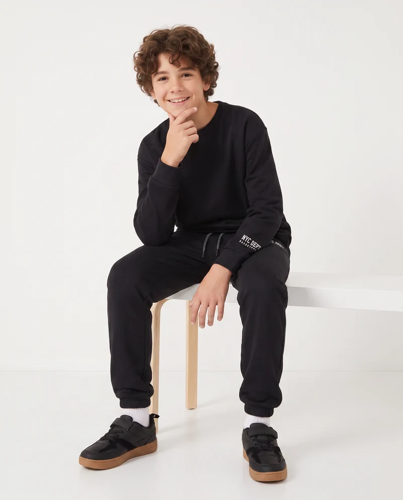 Jogger in felpa con coulisse e patch - Nero