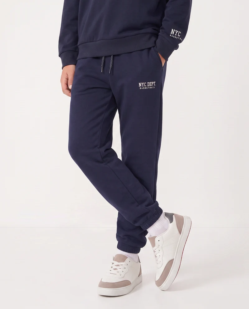 Jogger in felpa con coulisse e patch - Blu