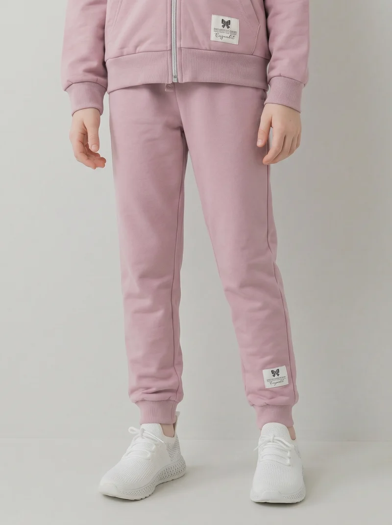 Jogger in felpa di cotone con elastico - Rosa polvere