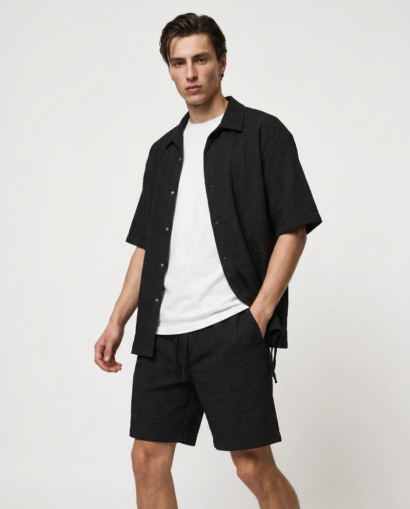 Camicia boxy fit in seer sucker con lacci - Nero