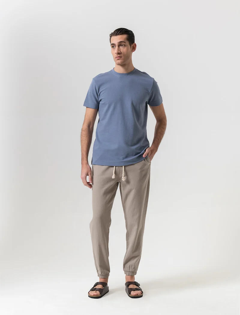 Pantaloni jogger tessuto strutturato da uomo - Verde salvia