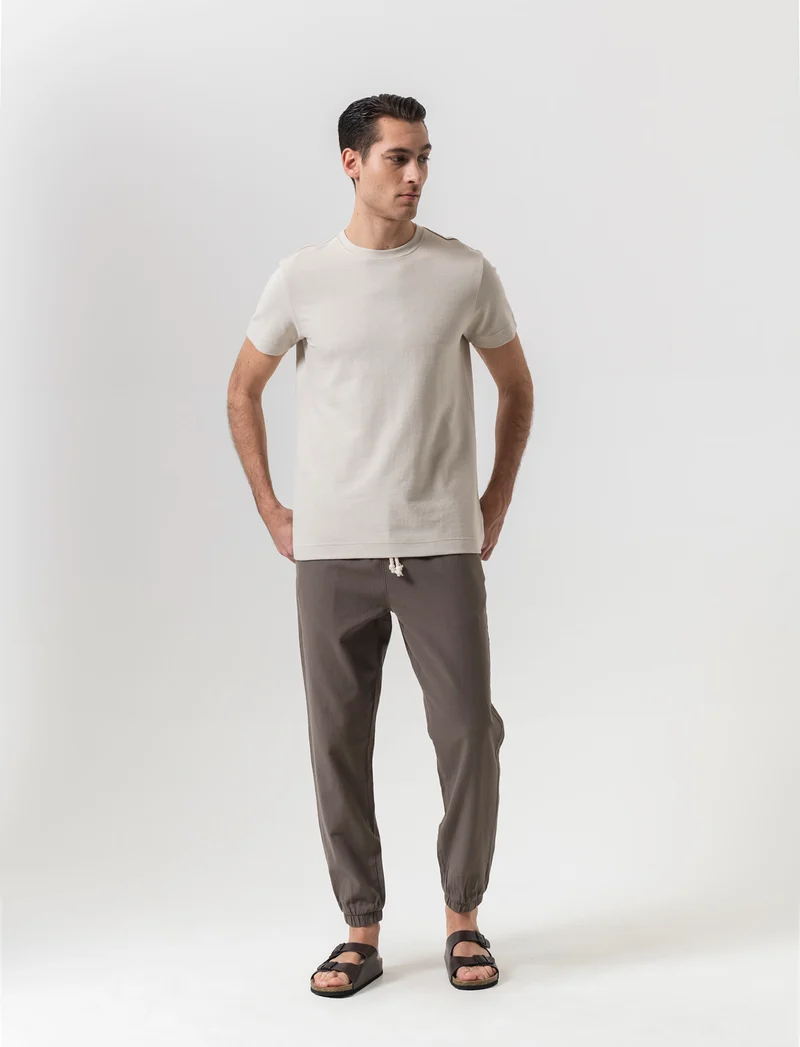 Pantaloni jogger tessuto strutturato da uomo - Verde kaki