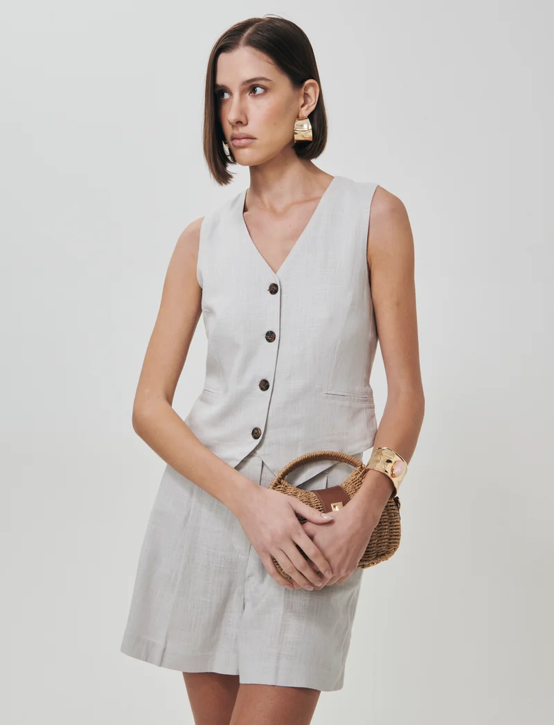 Gilet con tasche a taglio davanti - Sabbia