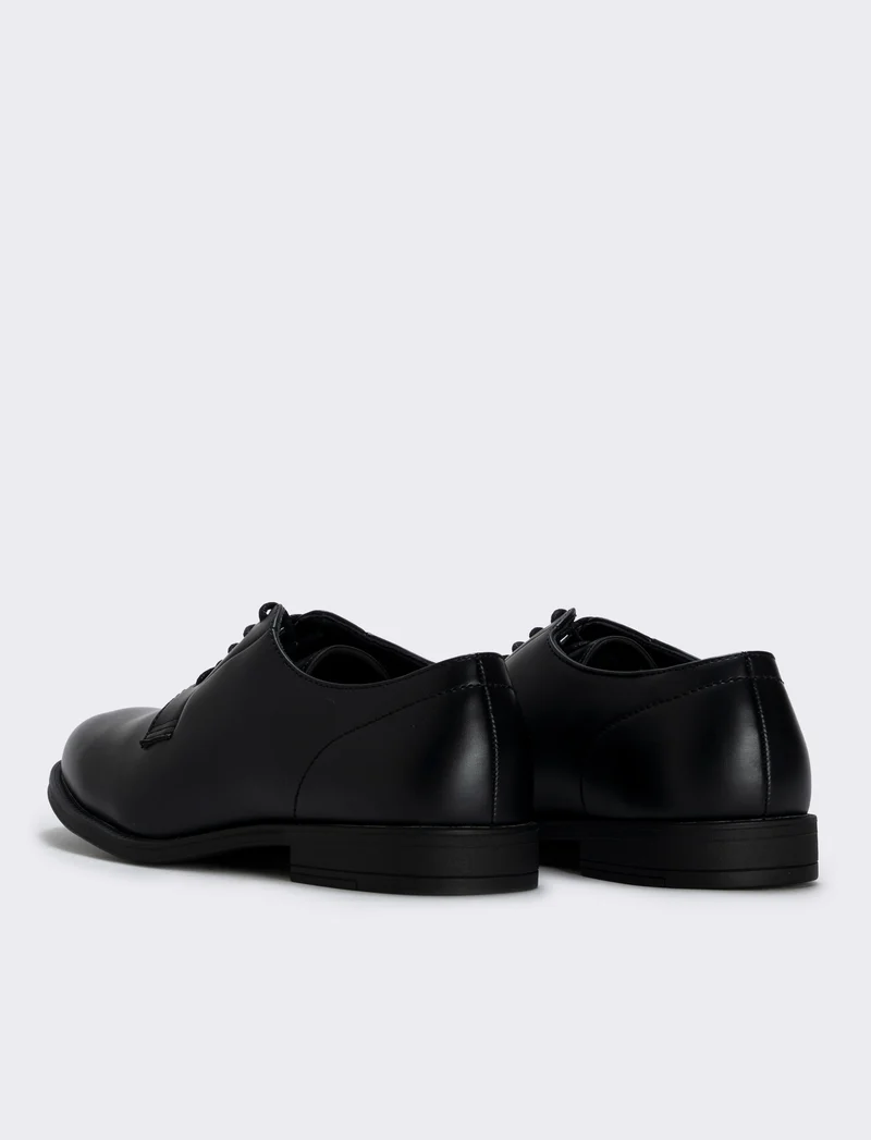 Scarpa stringata uomo in poliuretano nero - Nero