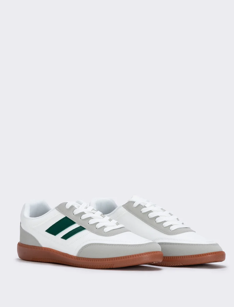 Sneakers bianche con inserti verdi da uomo - Bianco