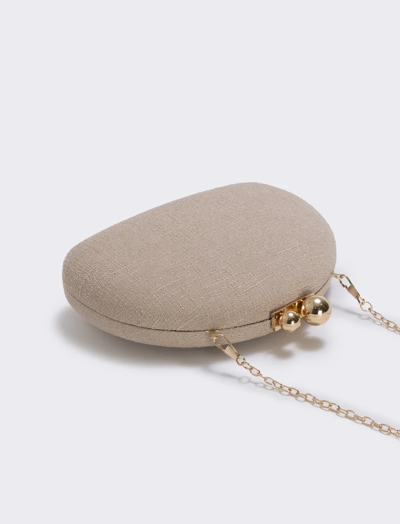 Borsetta clutch rigida mezzaluna in tessuto - Beige