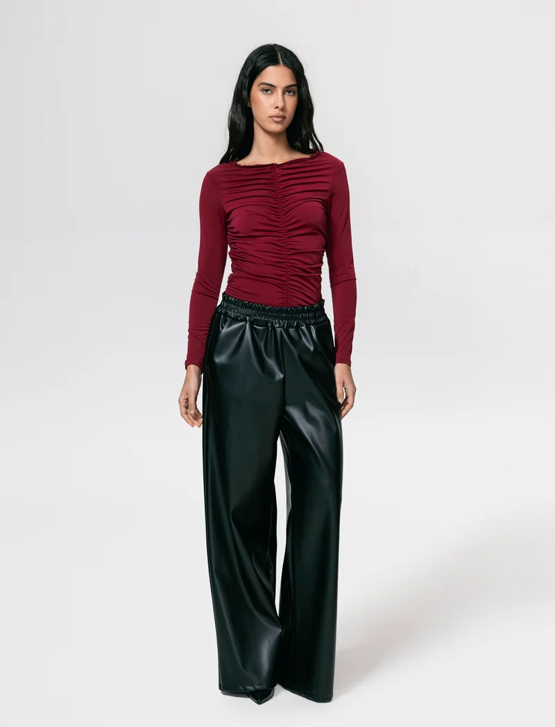 Pantalone palazzo con elastico in vita in ecopelle - Nero