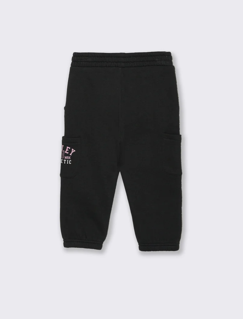 Jogger ampi con tasche e coulisse - Nero