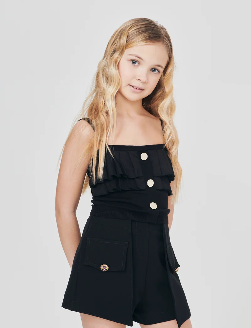 Top elegante in maglia con balze e bottoni - Nero