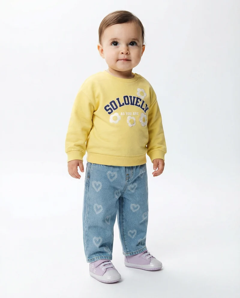 Jeans ampi con cuori in fantasia - Denim