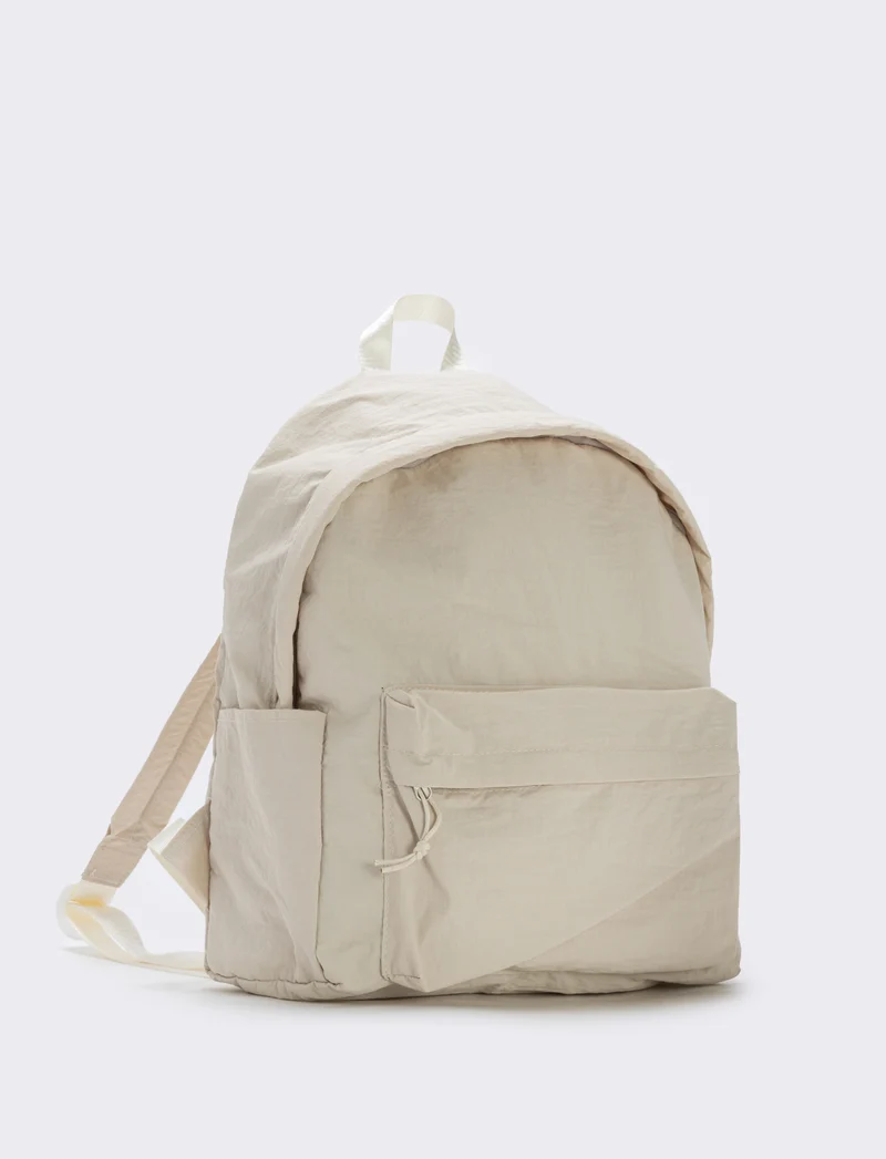 Zaino nylon con tasca frontale - Beige